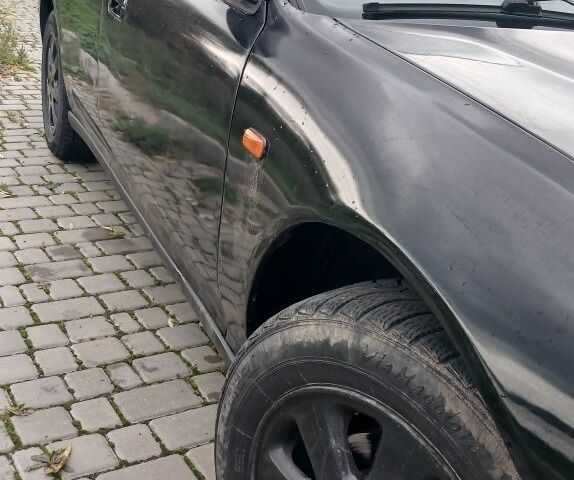 Черный Хонда Аккорд, объемом двигателя 2 л и пробегом 300 тыс. км за 2350 $, фото 6 на Automoto.ua