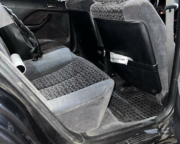 Черный Хонда Аккорд, объемом двигателя 2 л и пробегом 394 тыс. км за 2499 $, фото 7 на Automoto.ua