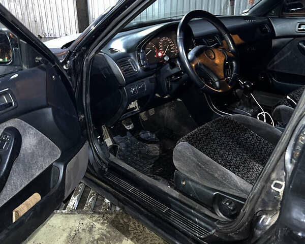 Черный Хонда Аккорд, объемом двигателя 2 л и пробегом 394 тыс. км за 2499 $, фото 4 на Automoto.ua