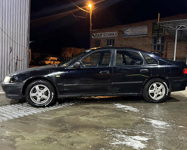 Черный Хонда Аккорд, объемом двигателя 2 л и пробегом 394 тыс. км за 2499 $, фото 3 на Automoto.ua