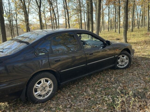 Черный Хонда Аккорд, объемом двигателя 2.2 л и пробегом 408 тыс. км за 3300 $, фото 5 на Automoto.ua