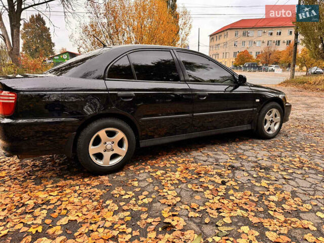 Черный Хонда Аккорд, объемом двигателя 1.85 л и пробегом 333 тыс. км за 2950 $, фото 8 на Automoto.ua