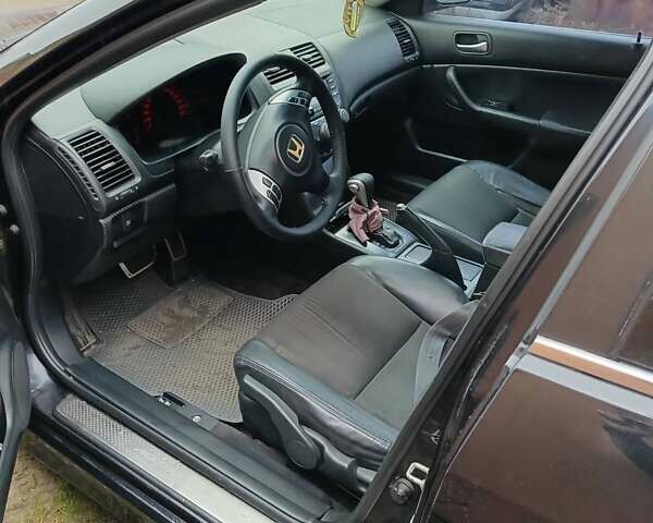 Черный Хонда Аккорд, объемом двигателя 2.4 л и пробегом 308 тыс. км за 6300 $, фото 4 на Automoto.ua