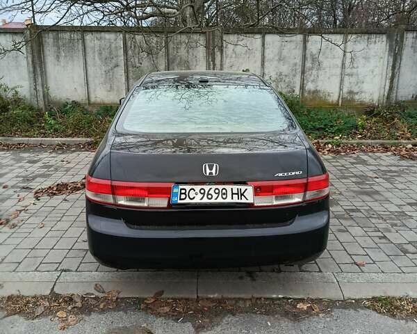 Черный Хонда Аккорд, объемом двигателя 2.4 л и пробегом 250 тыс. км за 4500 $, фото 1 на Automoto.ua