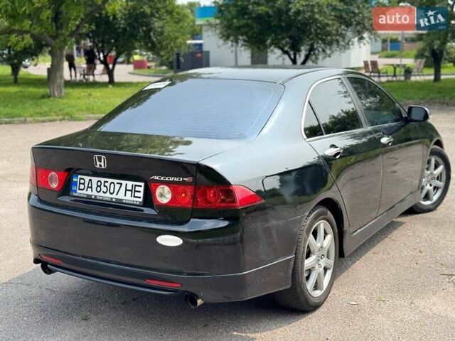 Черный Хонда Аккорд, объемом двигателя 2.4 л и пробегом 270 тыс. км за 5800 $, фото 6 на Automoto.ua