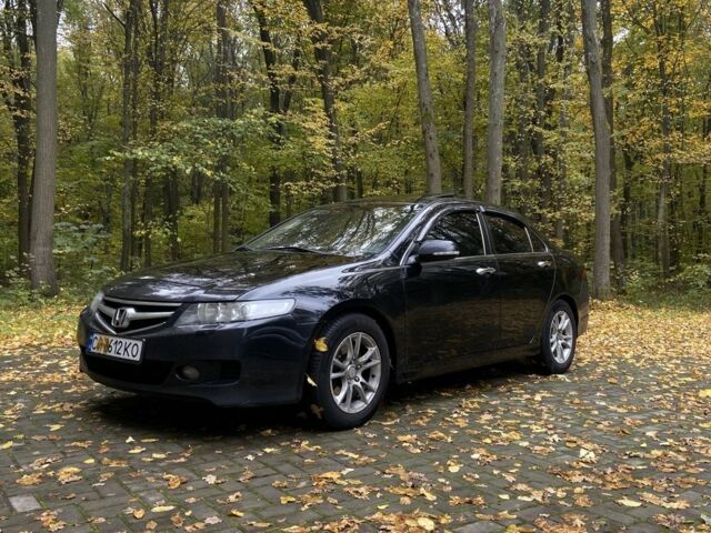 Черный Хонда Аккорд, объемом двигателя 2.4 л и пробегом 200 тыс. км за 6000 $, фото 1 на Automoto.ua