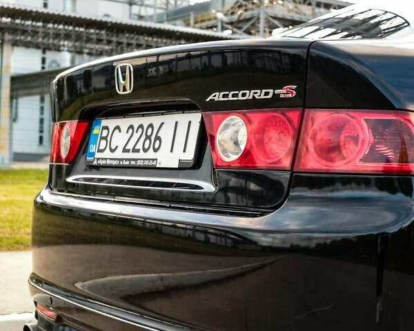 Черный Хонда Аккорд, объемом двигателя 2.4 л и пробегом 307 тыс. км за 5999 $, фото 4 на Automoto.ua