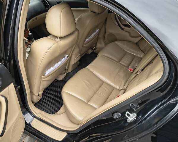 Черный Хонда Аккорд, объемом двигателя 2 л и пробегом 297 тыс. км за 6700 $, фото 2 на Automoto.ua