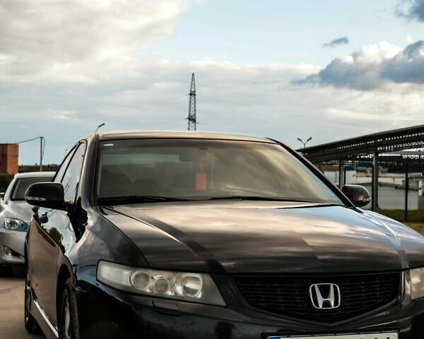 Черный Хонда Аккорд, объемом двигателя 2.4 л и пробегом 307 тыс. км за 5999 $, фото 1 на Automoto.ua