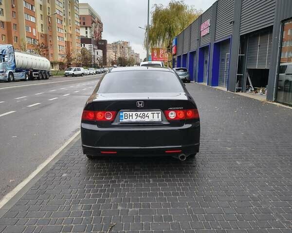 Черный Хонда Аккорд, объемом двигателя 2 л и пробегом 297 тыс. км за 6700 $, фото 5 на Automoto.ua