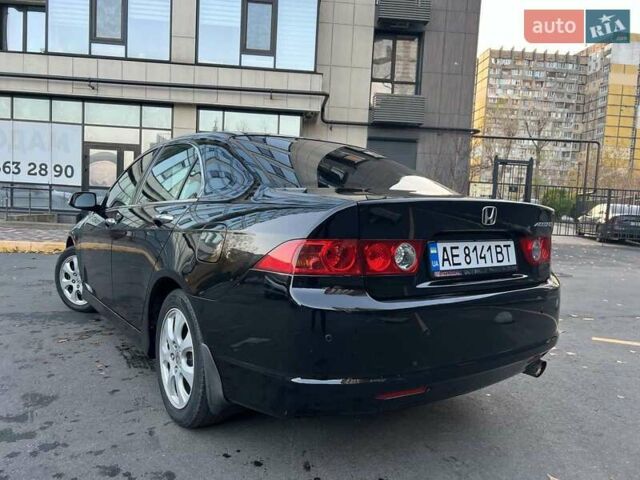 Черный Хонда Аккорд, объемом двигателя 2 л и пробегом 177 тыс. км за 7700 $, фото 1 на Automoto.ua