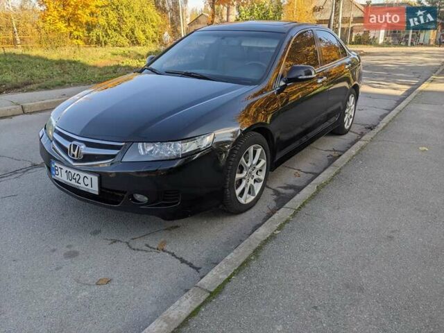 Черный Хонда Аккорд, объемом двигателя 2.4 л и пробегом 298 тыс. км за 5650 $, фото 1 на Automoto.ua