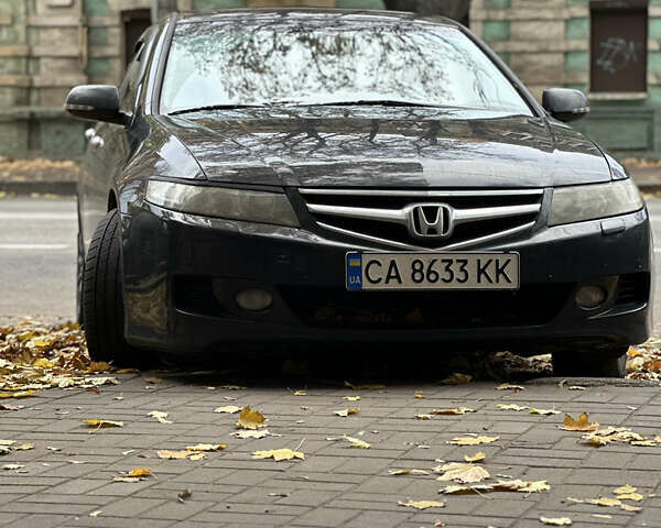 Черный Хонда Аккорд, объемом двигателя 2.4 л и пробегом 339 тыс. км за 6400 $, фото 1 на Automoto.ua