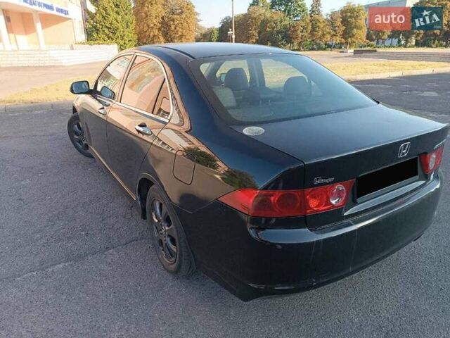 Черный Хонда Аккорд, объемом двигателя 2 л и пробегом 334 тыс. км за 5999 $, фото 7 на Automoto.ua