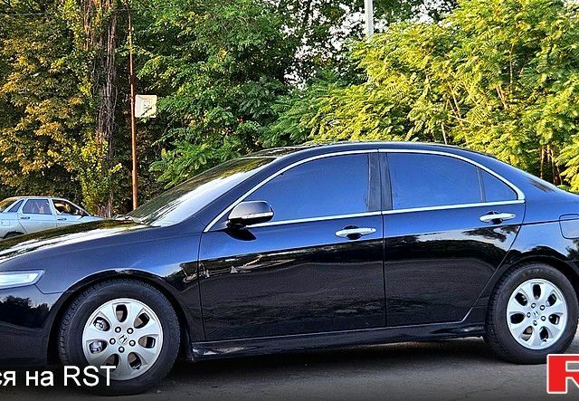 Черный Хонда Аккорд, объемом двигателя 2.4 л и пробегом 173 тыс. км за 6800 $, фото 1 на Automoto.ua