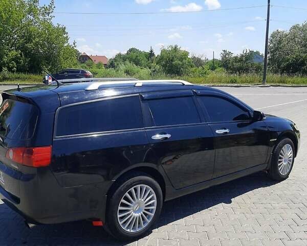Черный Хонда Аккорд, объемом двигателя 2 л и пробегом 195 тыс. км за 7000 $, фото 1 на Automoto.ua