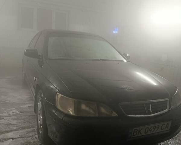 Черный Хонда Аккорд, объемом двигателя 1.99 л и пробегом 350 тыс. км за 1999 $, фото 1 на Automoto.ua
