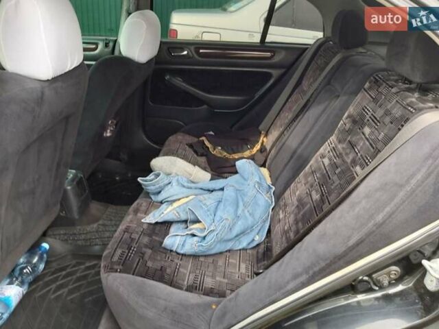 Черный Хонда Аккорд, объемом двигателя 1.6 л и пробегом 385 тыс. км за 3000 $, фото 4 на Automoto.ua