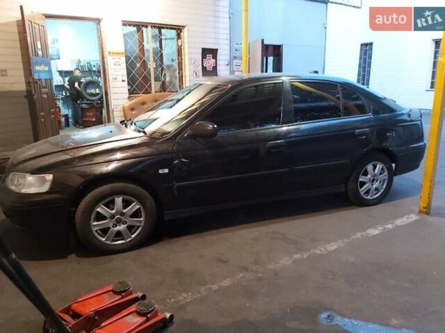 Черный Хонда Аккорд, объемом двигателя 1.6 л и пробегом 385 тыс. км за 3000 $, фото 1 на Automoto.ua