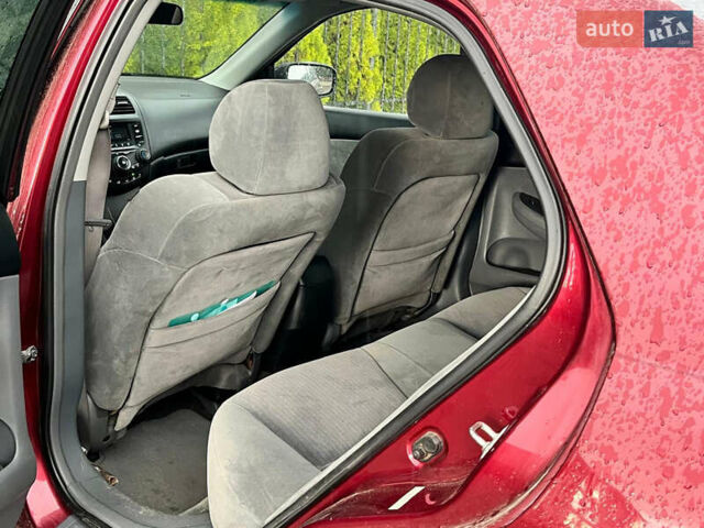 Красный Хонда Аккорд, объемом двигателя 3 л и пробегом 306 тыс. км за 4950 $, фото 7 на Automoto.ua