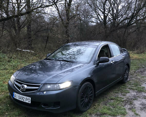 Сірий Хонда Аккорд, об'ємом двигуна 2.35 л та пробігом 244 тис. км за 5600 $, фото 1 на Automoto.ua