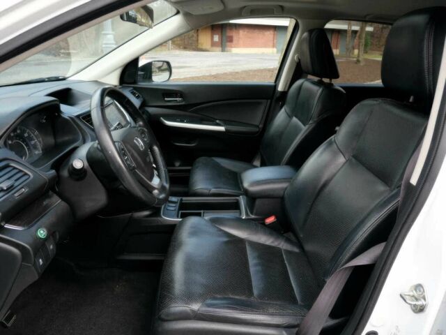 Белый Хонда СРВ, объемом двигателя 2.4 л и пробегом 77 тыс. км за 9900 $, фото 6 на Automoto.ua