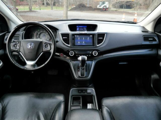 Хонда СРВ 2016 в Черкассах на Automoto.ua Белый Хонда СРВ, объемом двигателя 2.4 л и пробегом 80 тыс. км за 9300 $, фото 7 на Automoto.ua