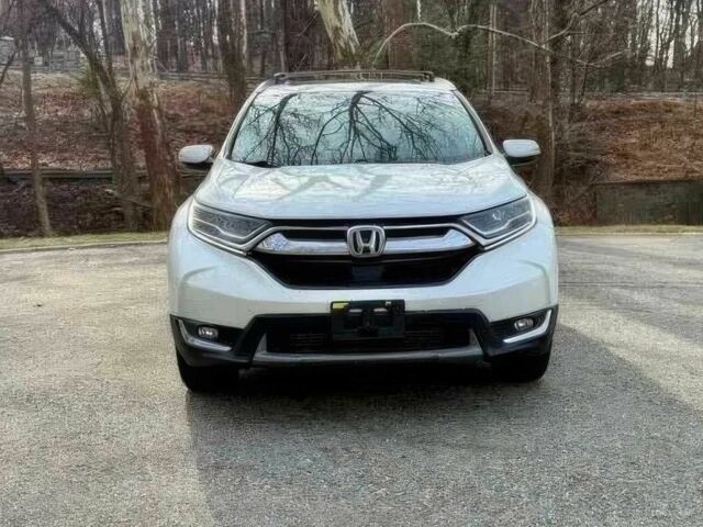 Белый Хонда СРВ, объемом двигателя 1.5 л и пробегом 57 тыс. км за 6800 $, фото 1 на Automoto.ua