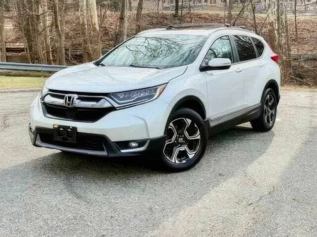 Белый Хонда СРВ, объемом двигателя 1.5 л и пробегом 57 тыс. км за 6800 $, фото 2 на Automoto.ua