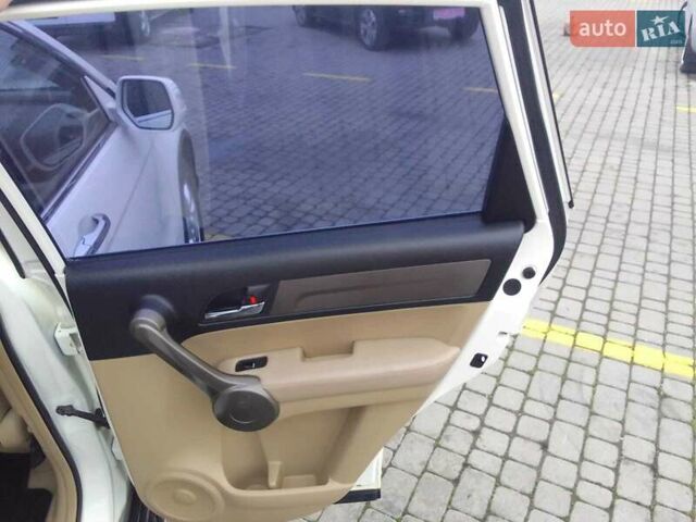 Белый Хонда СРВ, объемом двигателя 2.35 л и пробегом 133 тыс. км за 10200 $, фото 16 на Automoto.ua