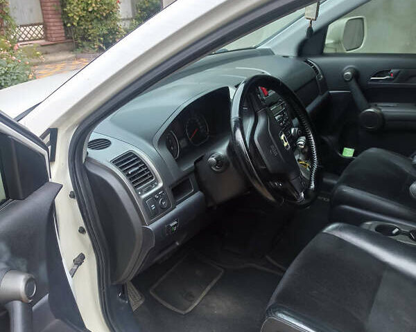 Белый Хонда СРВ, объемом двигателя 2.35 л и пробегом 190 тыс. км за 11800 $, фото 5 на Automoto.ua