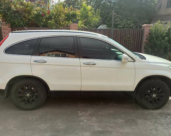 Белый Хонда СРВ, объемом двигателя 2.35 л и пробегом 190 тыс. км за 11800 $, фото 1 на Automoto.ua