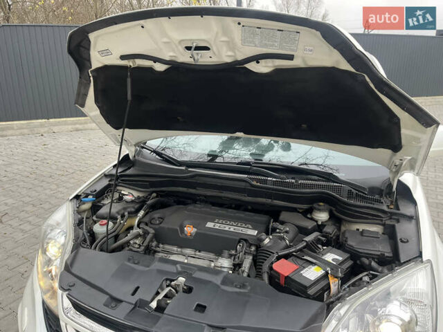 Белый Хонда СРВ, объемом двигателя 2.2 л и пробегом 159 тыс. км за 15550 $, фото 33 на Automoto.ua