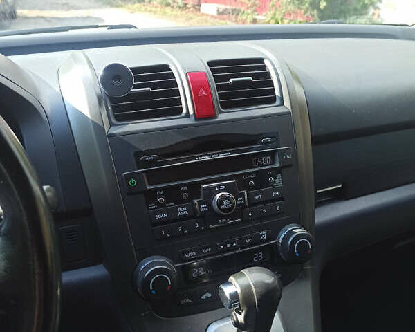 Белый Хонда СРВ, объемом двигателя 2.35 л и пробегом 190 тыс. км за 11800 $, фото 8 на Automoto.ua