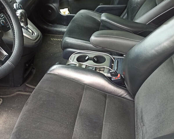 Белый Хонда СРВ, объемом двигателя 2.35 л и пробегом 190 тыс. км за 11800 $, фото 7 на Automoto.ua