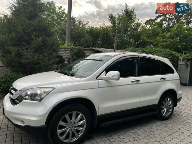 Белый Хонда СРВ, объемом двигателя 2.2 л и пробегом 209 тыс. км за 14300 $, фото 1 на Automoto.ua