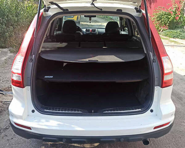 Белый Хонда СРВ, объемом двигателя 2.35 л и пробегом 190 тыс. км за 11800 $, фото 4 на Automoto.ua