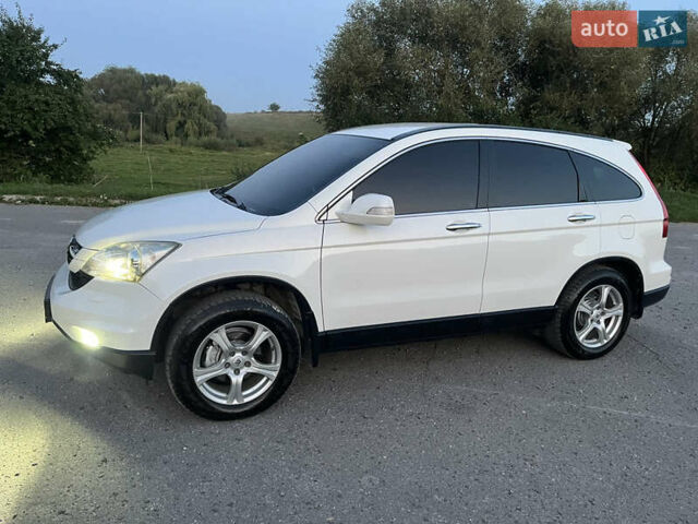 Білий Хонда СРВ, об'ємом двигуна 2.2 л та пробігом 270 тис. км за 12600 $, фото 25 на Automoto.ua