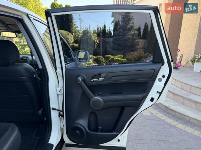 Белый Хонда СРВ, объемом двигателя 2.2 л и пробегом 219 тыс. км за 13691 $, фото 56 на Automoto.ua