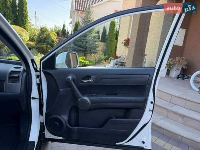 Белый Хонда СРВ, объемом двигателя 2.2 л и пробегом 219 тыс. км за 13691 $, фото 64 на Automoto.ua