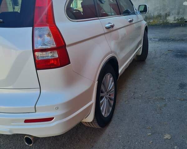 Белый Хонда СРВ, объемом двигателя 2.4 л и пробегом 290 тыс. км за 13200 $, фото 2 на Automoto.ua