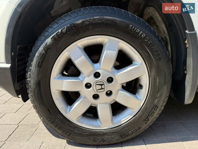 Белый Хонда СРВ, объемом двигателя 2.2 л и пробегом 219 тыс. км за 13691 $, фото 76 на Automoto.ua