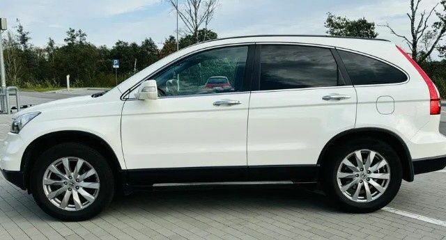 Белый Хонда СРВ, объемом двигателя 2 л и пробегом 187 тыс. км за 9200 $, фото 1 на Automoto.ua