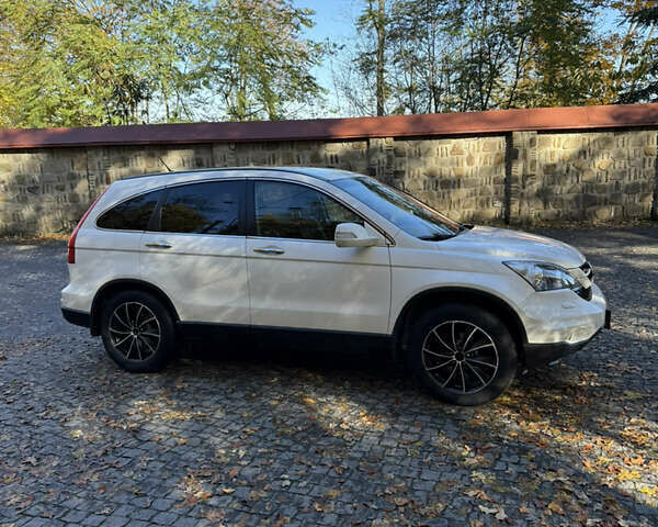 Белый Хонда СРВ, объемом двигателя 2.2 л и пробегом 330 тыс. км за 14300 $, фото 2 на Automoto.ua