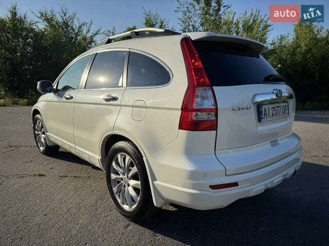 Белый Хонда СРВ, объемом двигателя 2.35 л и пробегом 165 тыс. км за 13000 $, фото 3 на Automoto.ua