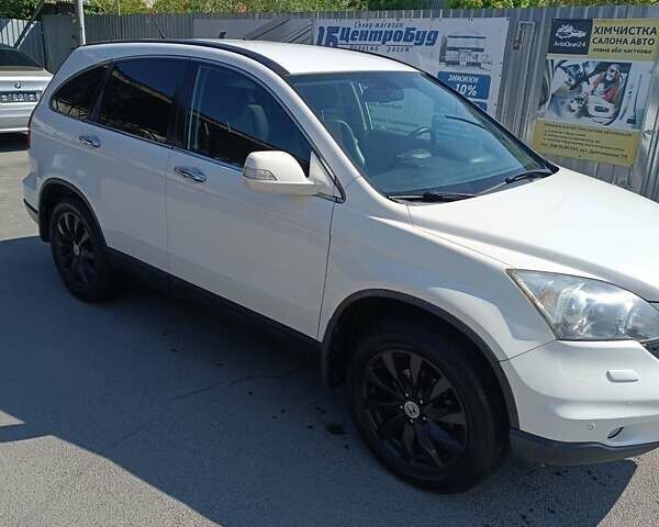 Белый Хонда СРВ, объемом двигателя 2.2 л и пробегом 306 тыс. км за 13100 $, фото 2 на Automoto.ua