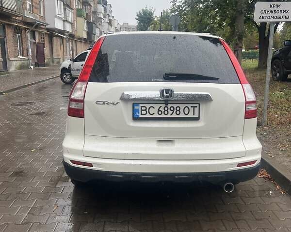 Белый Хонда СРВ, объемом двигателя 2.35 л и пробегом 198 тыс. км за 11500 $, фото 3 на Automoto.ua