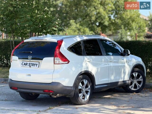 Білий Хонда СРВ, об'ємом двигуна 2 л та пробігом 205 тис. км за 15500 $, фото 20 на Automoto.ua