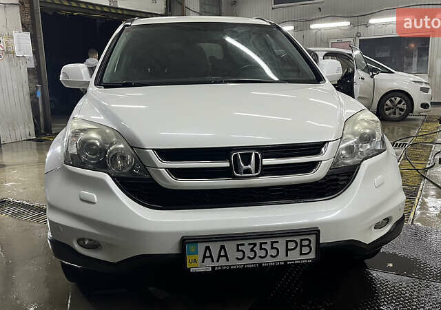 Белый Хонда СРВ, объемом двигателя 2 л и пробегом 128 тыс. км за 15000 $, фото 1 на Automoto.ua