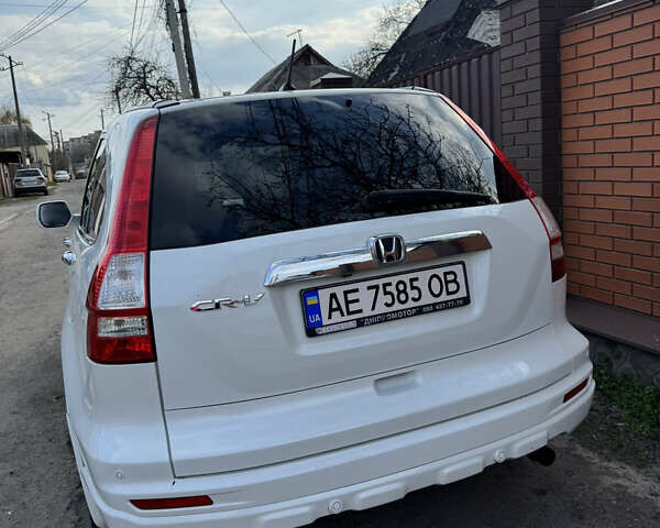 Белый Хонда СРВ, объемом двигателя 2.4 л и пробегом 176 тыс. км за 12900 $, фото 2 на Automoto.ua